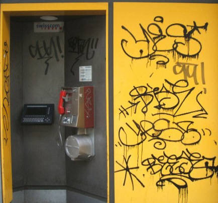 gepimpte Telefonzelle am Helvetiaplatz Zrich. pimped up phone booth full of graffiti tags in Zurich Switzerland.