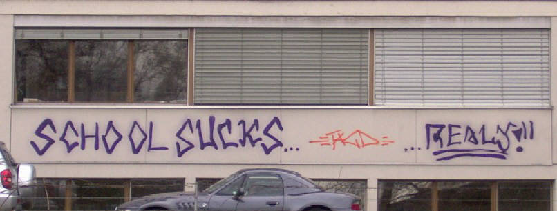 school sucks...really. graffiti tags on kuengenmatt schoolhouse in zurich switezrland. schulhaus kngenmatt zrich wiedikon
